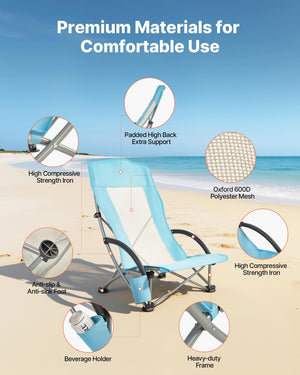 Portable folding beach chair with padded armrests, neck pillow, and convenient cup holder