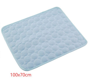 Ice silk cooling pet mat placed on dog crate floor