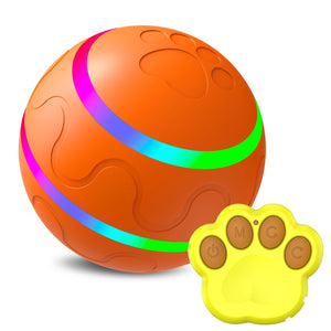 cat playing with interactive intelligent ball toy indoors