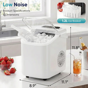White ice maker with ice basket on a kitchen counter, surrounded by strawberries and a drink.