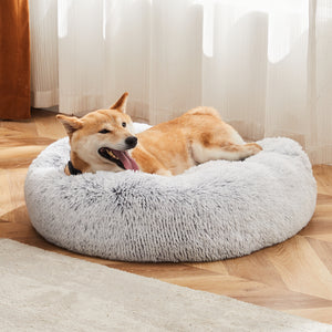 Close up of memory foam support in a round calming pet bed