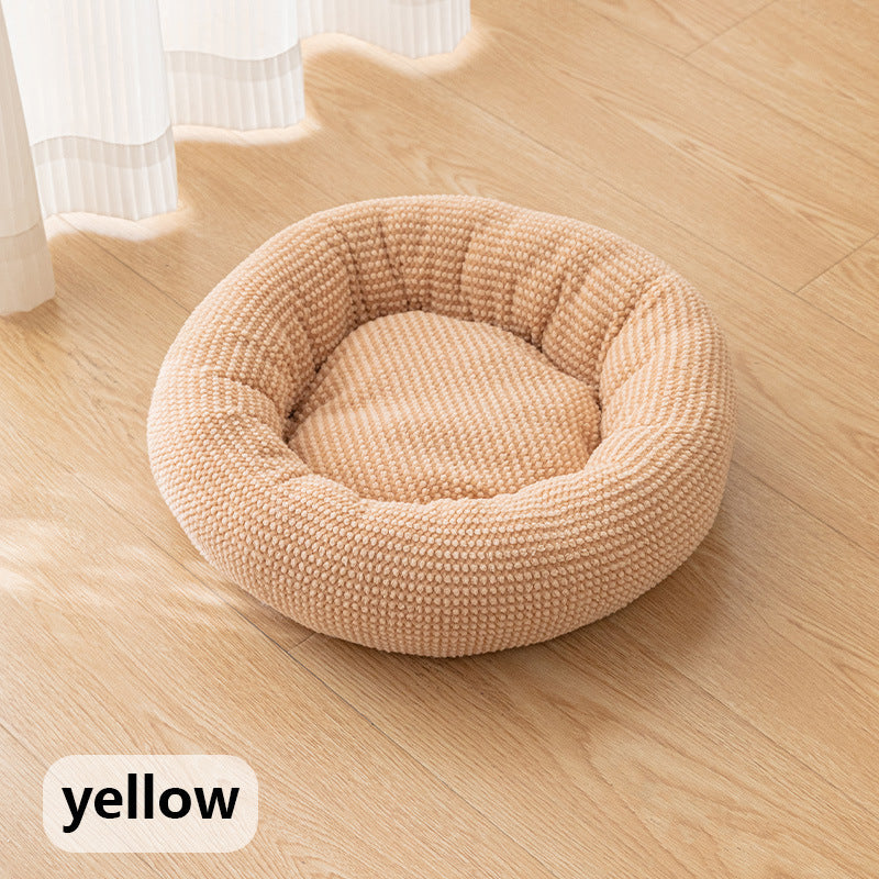 Vacuum packed pet bed expanding into a fluffy cushion