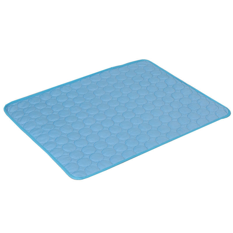 Cat lying on ice silk cooling mat in blue color