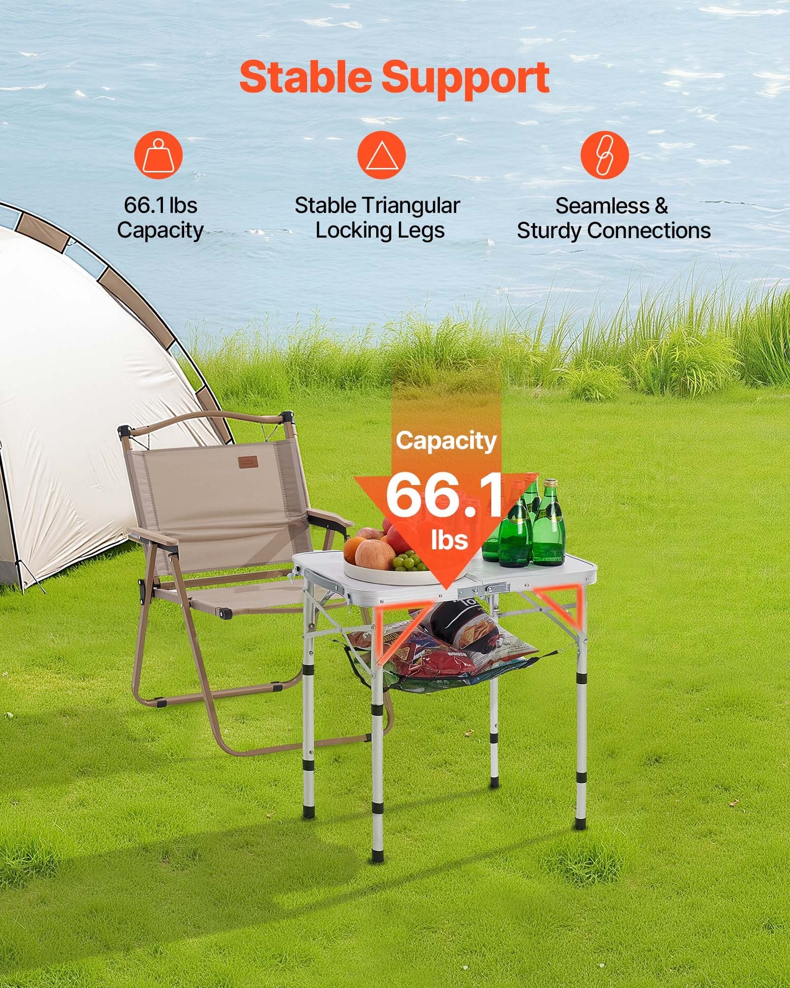 Camping chair and table set with stable support features on a grassy field.