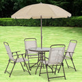 6-piece patio dining set with umbrella, tempered glass table, and four folding chairs for outdoor dining