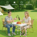 24-inch MDF folding table with a man and woman sitting outdoors, enjoying drinks and food.