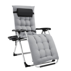 Outdoor reclining chair featuring removable cushion and padded headrest for enhanced comfort