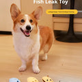 Fish shaped dog treat dispenser toy for interactive play