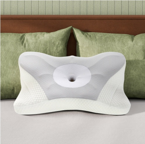 Foam bolster pillow supporting neck and spine alignment