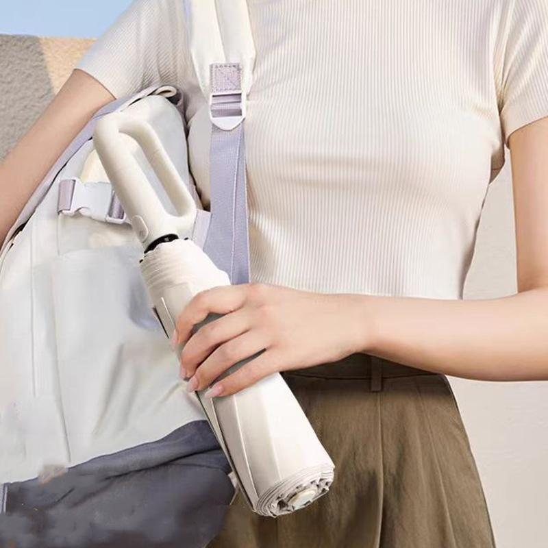 Strong folding umbrella with ergonomic handle and reinforced windproof frame