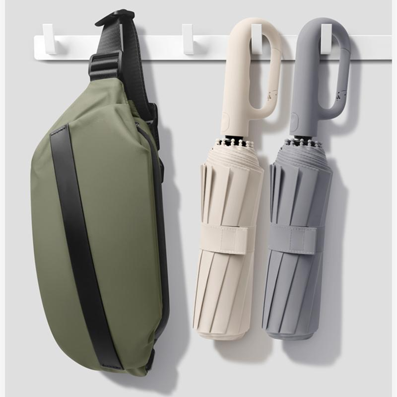 Compact windproof folding umbrella with automatic open and close for travel and daily commuting