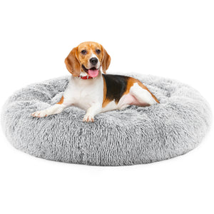 Grey plush donut dog bed for calming anxiety in small dogs