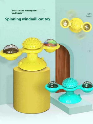 Suction cup mounted interactive cat toy